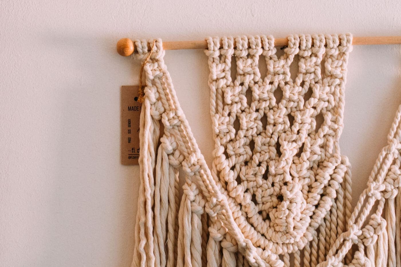 A handmade macrame wall hanging