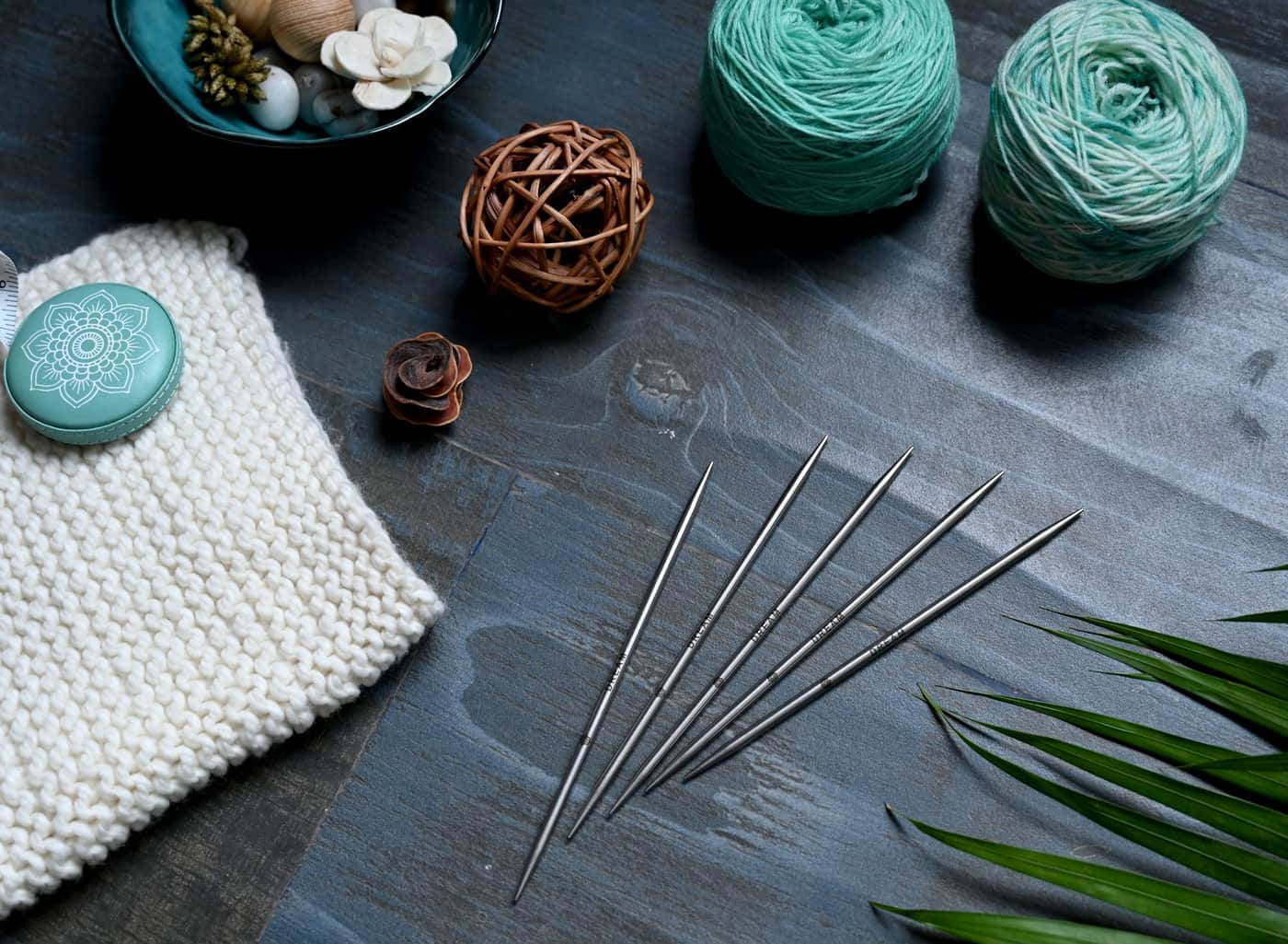 Close-up of knitting materials laid out together